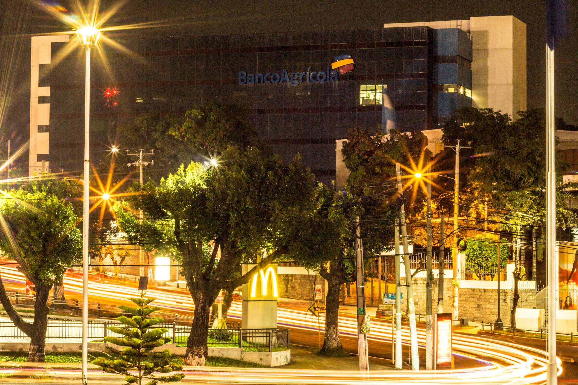 The Bancolombia building lit up at night