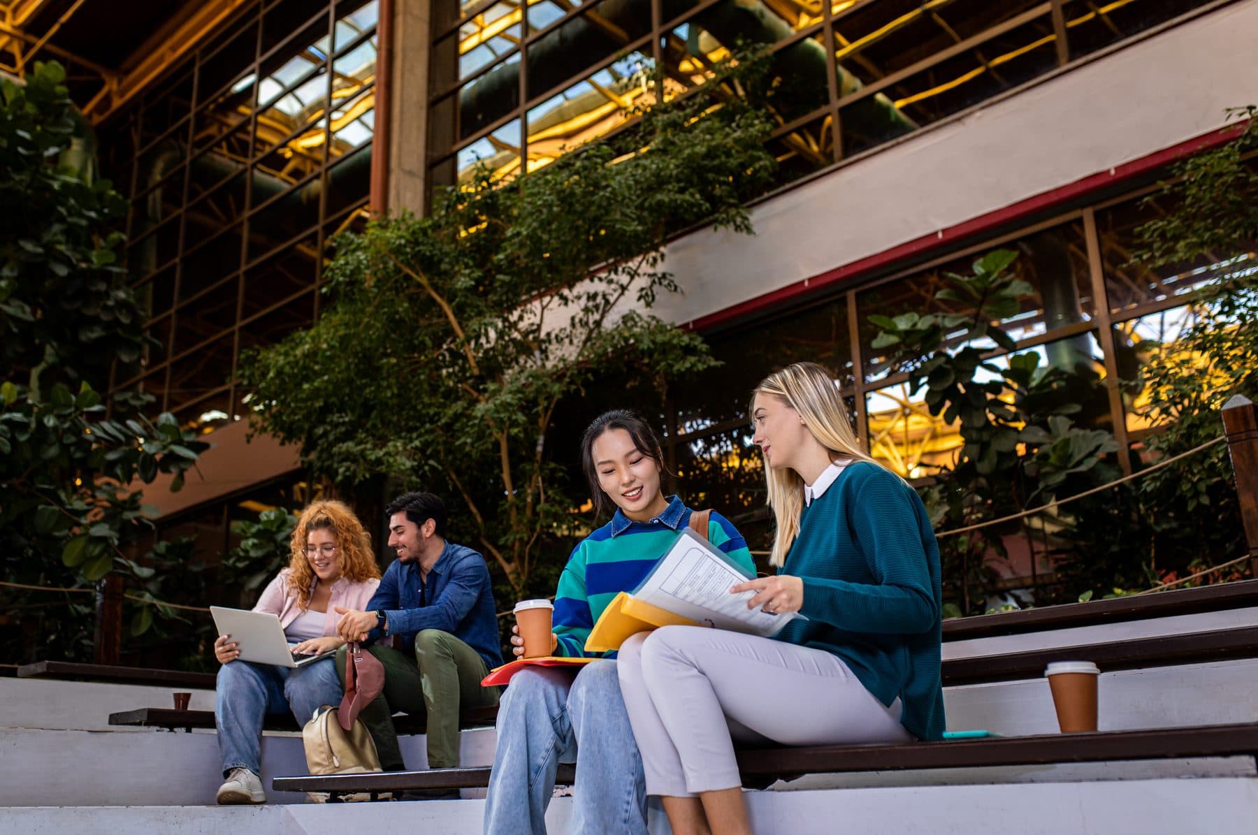International students talking on a university campus